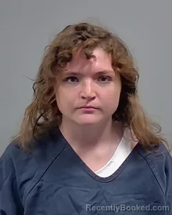 Mugshot of ISABELLA LOUISE KRUEGER booked in Escambia County, Florida on March 14, 2026