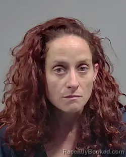 Mugshot of JENNIFER DANYEL PAULK booked in Escambia County, Florida on March 14, 2026