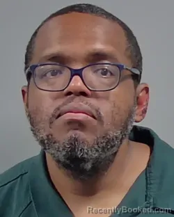 Mugshot of CARLOS ADRIAN CLEMONS booked in Escambia County, Florida on March 14, 2026