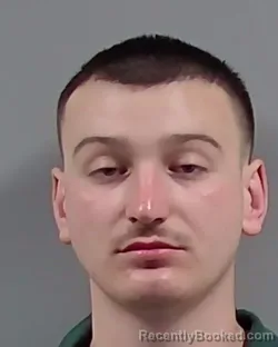 Mugshot of ELIJAH ZANE IGLESIAS booked in Escambia County, Florida on March 15, 2026