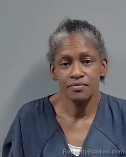 Mugshot of EMMA JEAN WOODS booked in Escambia County, Florida on March 15, 2026