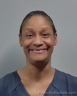 Mugshot of KENDRA MICHELLE TATE booked in Escambia County, Florida on March 15, 2026