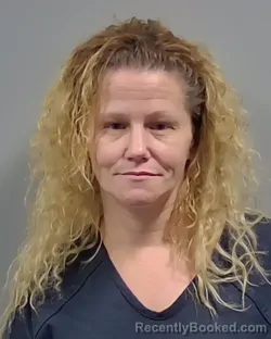 Mugshot of CHRISTINA ANN BELL booked in Escambia County, Florida on March 16, 2026