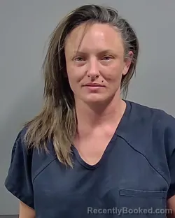 Mugshot of ASHLEY NICHOLE MONROE booked in Escambia County, Florida on March 18, 2026