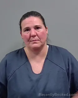 Mugshot of LESLEE DEE CURA booked in Escambia County, Florida on March 18, 2026