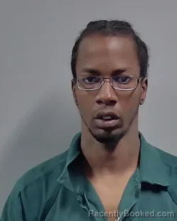 Mugshot of JEREMY TEE-YUAN KEYS booked in Escambia County, Florida on March 18, 2026