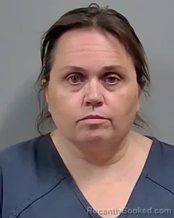 Mugshot of MONICA LEA LOVE booked in Escambia County, Florida on March 18, 2026