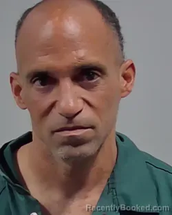 Mugshot of CHARLES EDWARD MONROE booked in Escambia County, Florida on March 19, 2026