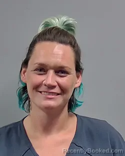 Mugshot of ASHLEY NICOLE MILLER booked in Escambia County, Florida on March 19, 2026