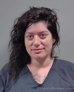 Mugshot of DAYNA ANNE WHITE booked in Escambia County, Florida on March 19, 2026