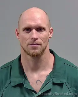 Mugshot of GEORGE JASON HOLTON booked in Escambia County, Florida on March 20, 2026