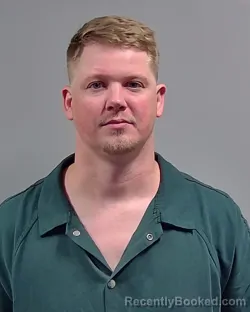 Mugshot of DEVIN RAY LEWIS booked in Escambia County, Florida on March 21, 2026