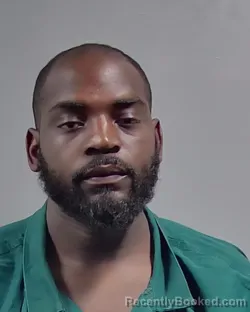 Mugshot of DANGELO CARTEZ TUCKER booked in Escambia County, Florida on March 21, 2026