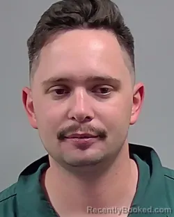 Mugshot of DERRICK ALAN SCHENCK booked in Escambia County, Florida on March 22, 2026