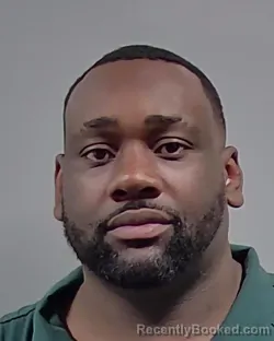 Mugshot of DOMINQUE LAKIETRELLE LEE booked in Escambia County, Florida on March 22, 2026