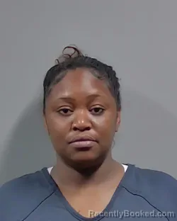 Mugshot of CELINA AUBRI BELL booked in Escambia County, Florida on March 22, 2026