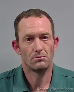 Mugshot of DONALD EDWARD BROWN booked in Escambia County, Florida on March 22, 2026