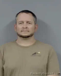 Mugshot of ANDREW ROBERT HARVEY booked in Escambia County, Florida on March 23, 2026