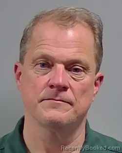 Mugshot of GEOFFREY JAREN COOK booked in Escambia County, Florida on March 23, 2026