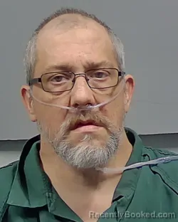 Mugshot of JOHN EDWARD FARVE booked in Escambia County, Florida on March 24, 2026