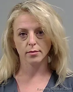 Mugshot of JOCELYN NICHOLE BAKER booked in Escambia County, Florida on March 24, 2026