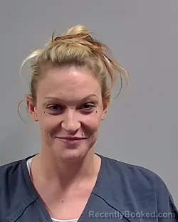 Mugshot of KAYLA EILEEN MACK booked in Escambia County, Florida on March 24, 2026