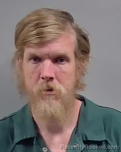 Mugshot of JONATHAN PATRICK MEEK booked in Escambia County, Florida on March 24, 2026