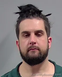 Mugshot of KRISTOPHER BAILEY DESPOSITO booked in Escambia County, Florida on March 24, 2026