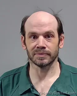 Mugshot of DENNIS JAMES SCHOONOVER booked in Escambia County, Florida on March 24, 2026