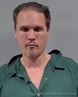 Mugshot of CHRISTOPHER CECIL BURRILL booked in Escambia County, Florida on March 24, 2026