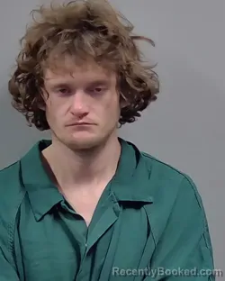 Mugshot of AARON JAMES ATKINS booked in Escambia County, Florida on March 24, 2026