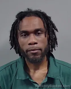 Mugshot of QUIMAINE DE'SHAWN KNOTT booked in Escambia County, Florida on March 26, 2026