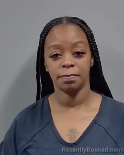 Mugshot of CANTRELL RENEE MOORE booked in Escambia County, Florida on March 26, 2026