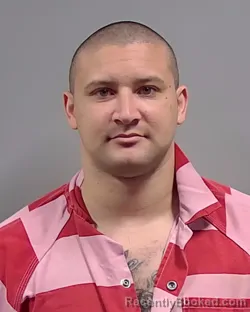 Mugshot of ALEXANDER GEORGE DELOACH booked in Escambia County, Florida on March 26, 2026