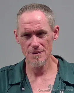 Mugshot of JASON KENNETH HENRICHS booked in Escambia County, Florida on March 26, 2026