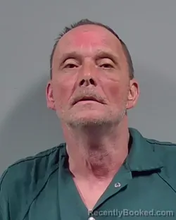 Mugshot of CHARLES HENRY DANIELS booked in Escambia County, Florida on March 26, 2026