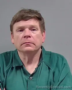 Mugshot of GARY MICHAEL OWENS booked in Escambia County, Florida on March 27, 2026