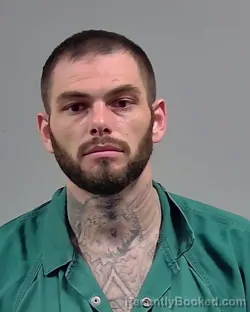 Mugshot of CHRISTOPHER MICHAEL SPRUILL booked in Escambia County, Florida on March 27, 2026