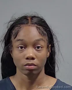 Mugshot of TAYLOR NICOLE SIMS booked in Escambia County, Florida on March 27, 2026