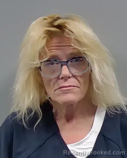 Mugshot of KAREN KAY COMBS booked in Escambia County, Florida on March 28, 2026