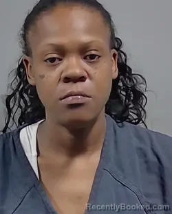 Mugshot of ROMEKA LEANN WATTS booked in Escambia County, Florida on March 28, 2026