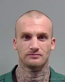 Mugshot of JOHN WESTLEY MILLER booked in Escambia County, Florida on March 30, 2026