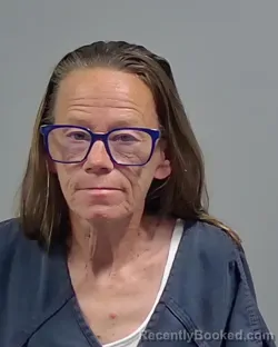 Mugshot of MELANIE EMMONS MOTT booked in Escambia County, Florida on March 31, 2026