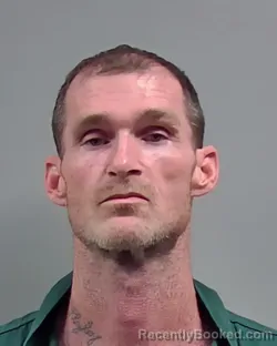 Mugshot of JONATHAN EDWARD MOORE booked in Escambia County, Florida on March 31, 2026