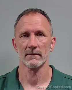 Mugshot of DANIEL RONNIE ADAMS booked in Escambia County, Florida on March 31, 2026