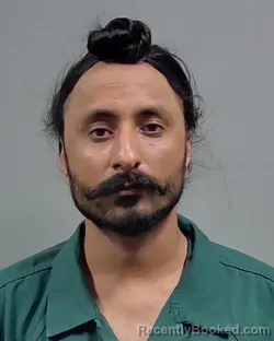 Mugshot of VIRENDER SINGH booked in Escambia County, Florida on March 31, 2026