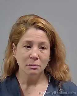 Mugshot of CYNTHIA MARIE MCGHEE booked in Escambia County, Florida on April 1, 2026