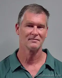 Mugshot of CHRISTOPHER HAROLD FREEMAN booked in Escambia County, Florida on April 2, 2026