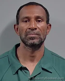 Mugshot of CHARLES RAY SANTIAGO booked in Escambia County, Florida on April 2, 2026