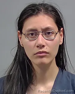 Mugshot of CHANEL MICHELLE SHARP booked in Escambia County, Florida on April 2, 2026